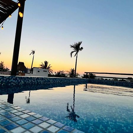Hotel Mayari Holbox Exteriör bild Sunset at the pool