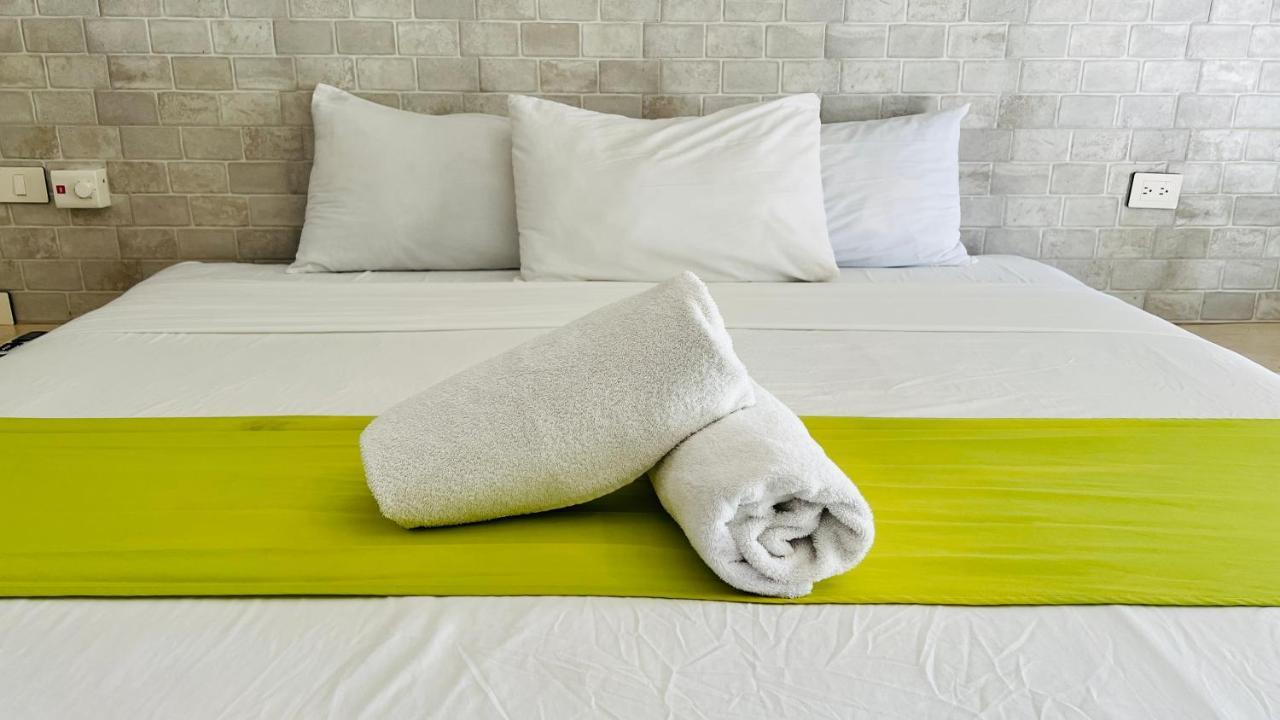 Hotel Mayari Holbox Exteriör bild Bath towels on a bed